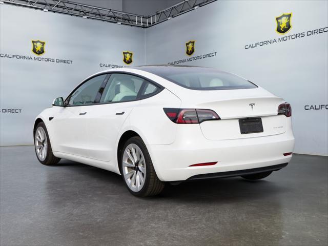 used 2022 Tesla Model 3 car, priced at $27,699