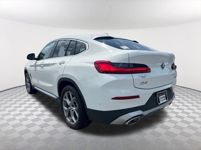 used 2022 BMW X4 car, priced at $37,992