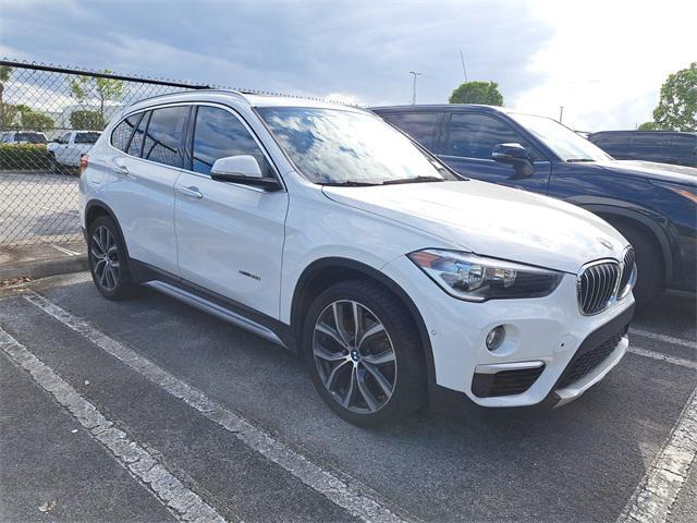 used 2018 BMW X1 car, priced at $13,999