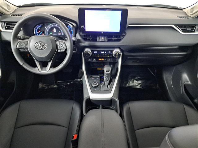 used 2024 Toyota RAV4 Hybrid car, priced at $32,777