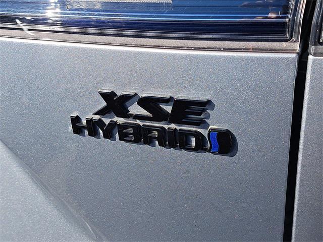 used 2024 Toyota Corolla Cross Hybrid car, priced at $27,599