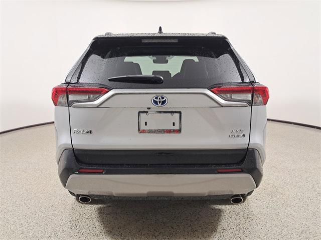 used 2023 Toyota RAV4 Hybrid car, priced at $32,599
