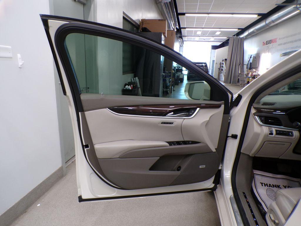 used 2013 Cadillac XTS car, priced at $16,556