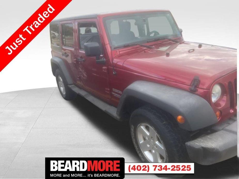 used 2012 Jeep Wrangler Unlimited car, priced at $16,977