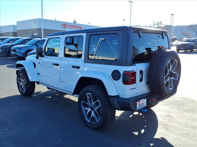 used 2024 Jeep Wrangler 4xe car, priced at $34,412