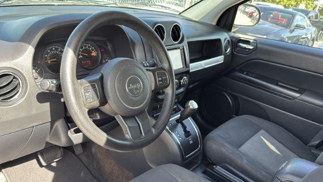 used 2015 Jeep Compass car, priced at $13,899