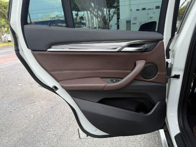 used 2018 BMW X1 car, priced at $11,899