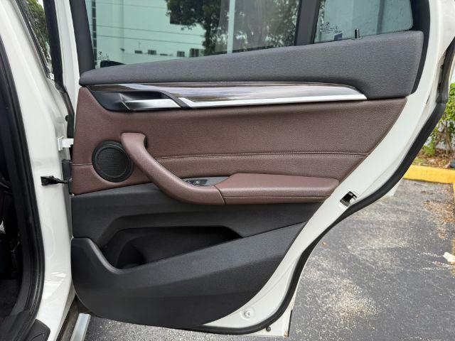 used 2018 BMW X1 car, priced at $11,899
