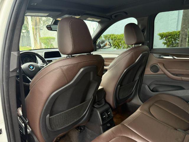 used 2018 BMW X1 car, priced at $11,899