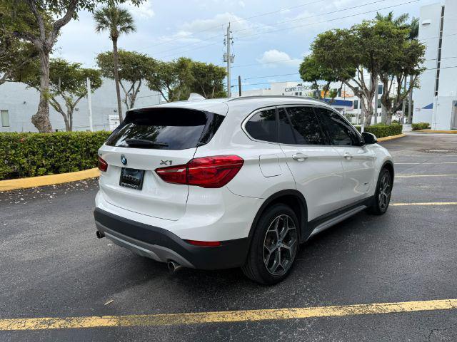 used 2018 BMW X1 car, priced at $11,899