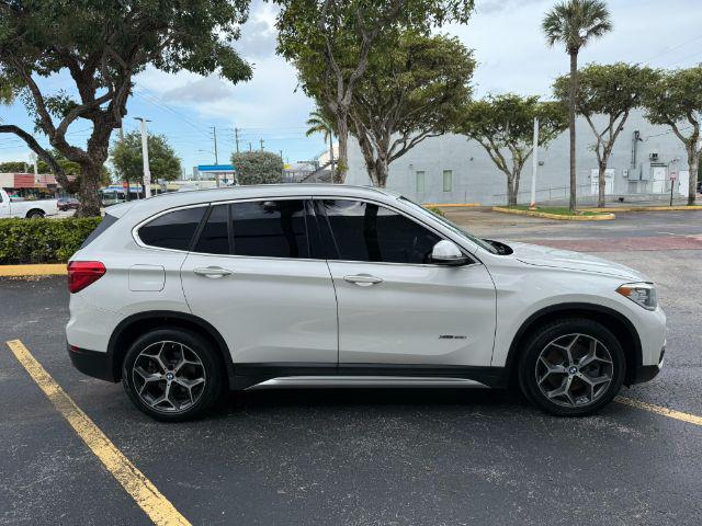 used 2018 BMW X1 car, priced at $11,899