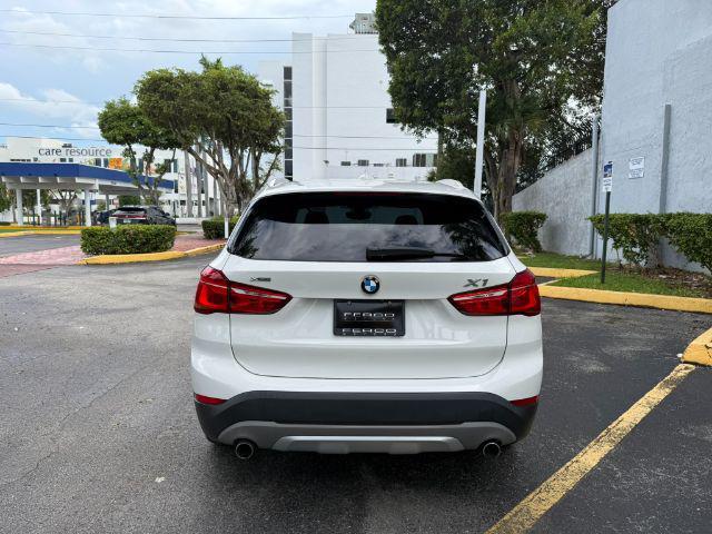 used 2018 BMW X1 car, priced at $11,899