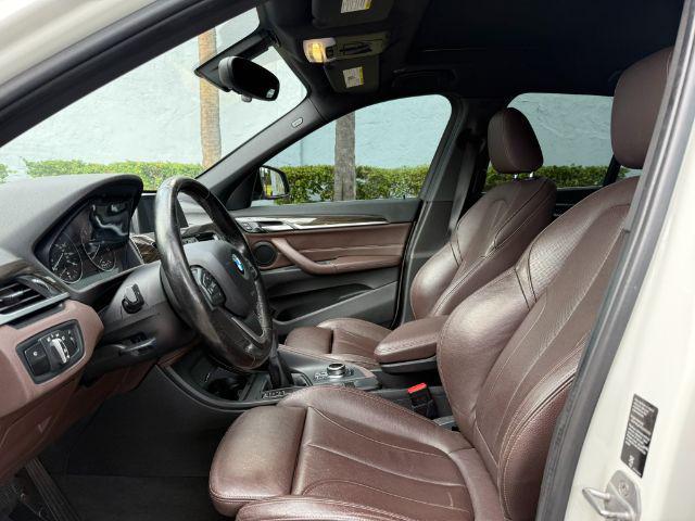 used 2018 BMW X1 car, priced at $11,899