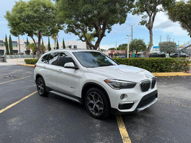 used 2018 BMW X1 car, priced at $11,899