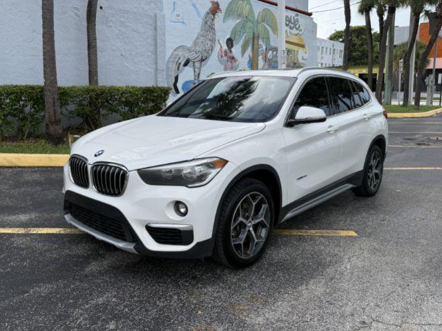 used 2018 BMW X1 car, priced at $11,899