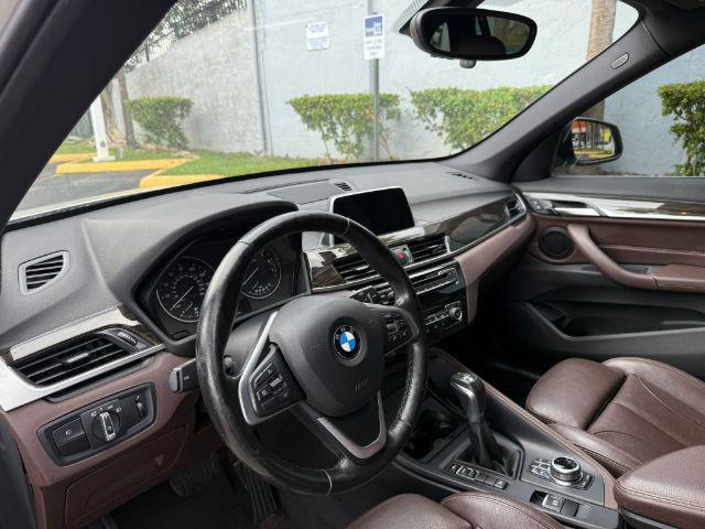used 2018 BMW X1 car, priced at $11,899