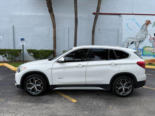 used 2018 BMW X1 car, priced at $11,899