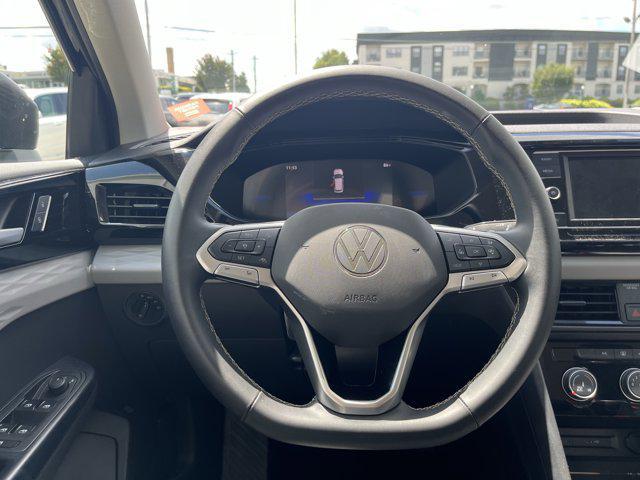 used 2024 Volkswagen Taos car, priced at $22,398
