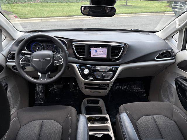 used 2023 Chrysler Voyager car, priced at $22,589