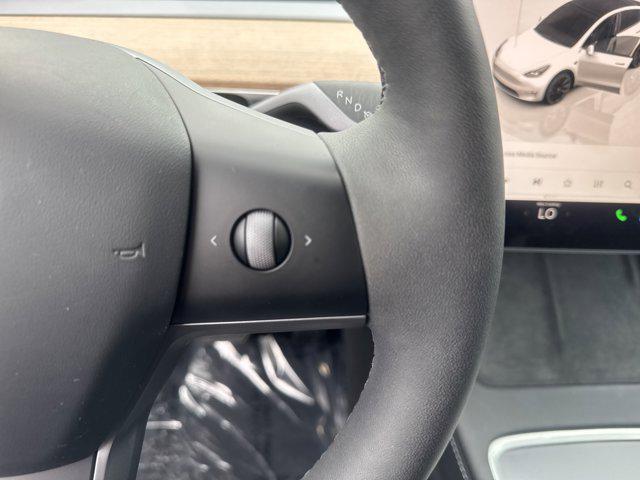 used 2024 Tesla Model Y car, priced at $35,989