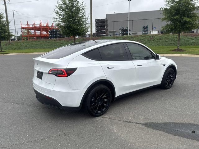 used 2024 Tesla Model Y car, priced at $35,989