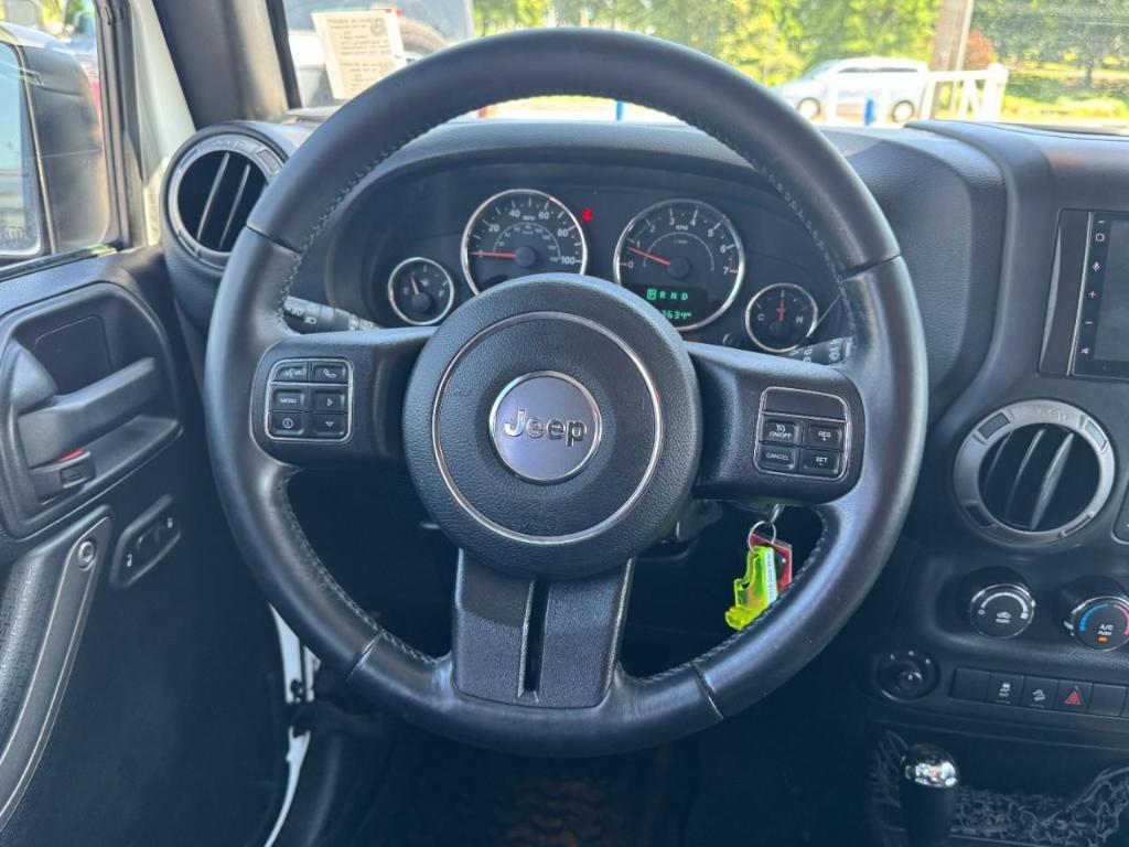 used 2016 Jeep Wrangler Unlimited car, priced at $16,990
