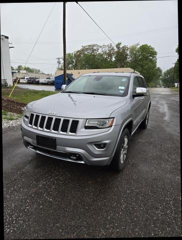 used 2014 Jeep Grand Cherokee car, priced at $16,478