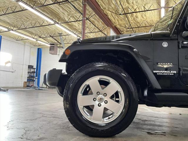 used 2012 Jeep Wrangler Unlimited car, priced at $16,302