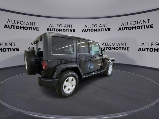 used 2012 Jeep Wrangler Unlimited car, priced at $16,268