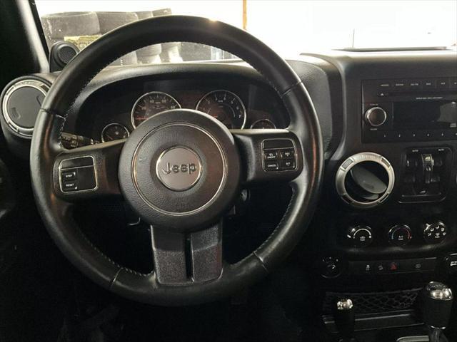 used 2012 Jeep Wrangler Unlimited car, priced at $16,302