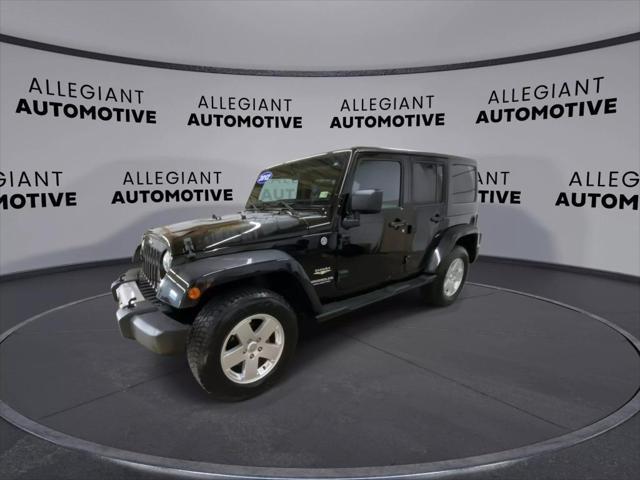 used 2012 Jeep Wrangler Unlimited car, priced at $16,302