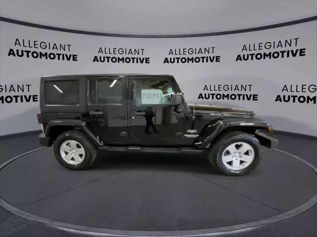 used 2012 Jeep Wrangler Unlimited car, priced at $16,268