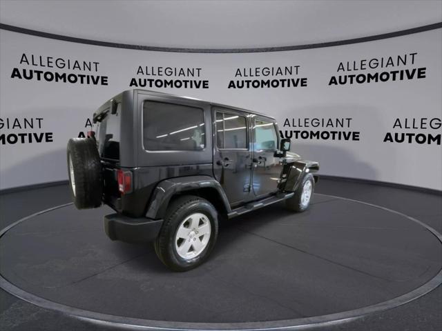 used 2012 Jeep Wrangler Unlimited car, priced at $16,302