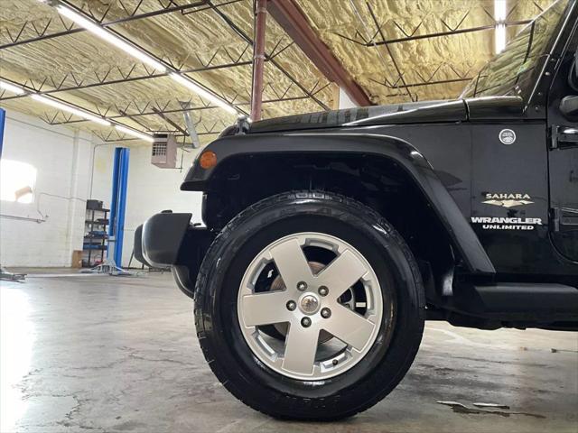 used 2012 Jeep Wrangler Unlimited car, priced at $16,268