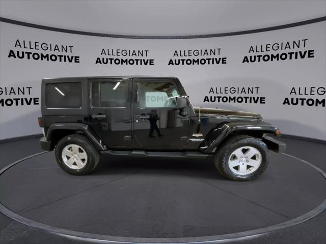 used 2012 Jeep Wrangler Unlimited car, priced at $16,302