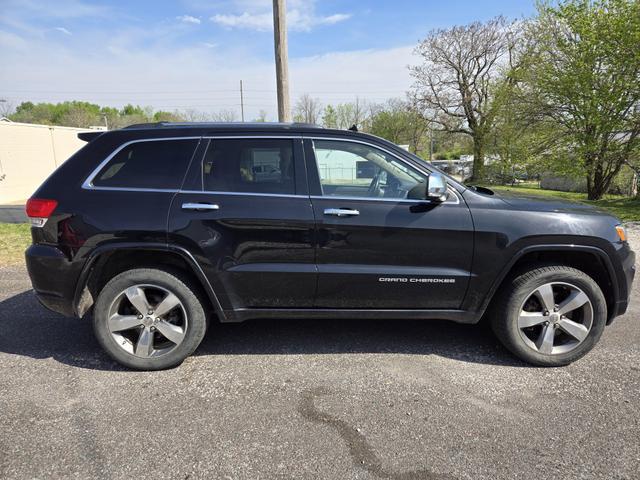 used 2014 Jeep Grand Cherokee car, priced at $17,503