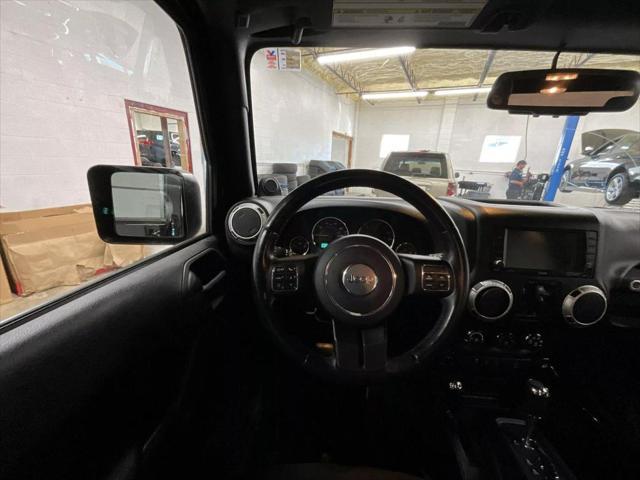 used 2014 Jeep Wrangler Unlimited car, priced at $19,938