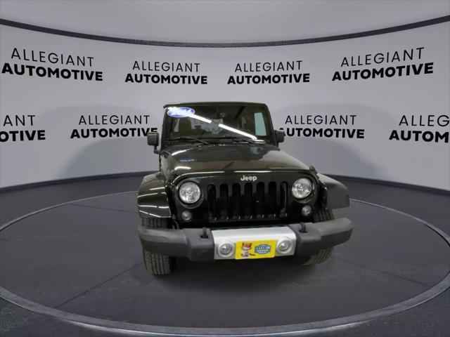 used 2014 Jeep Wrangler Unlimited car, priced at $19,117