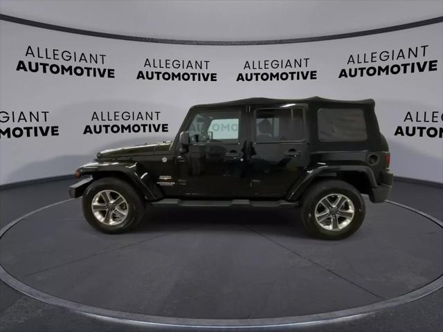 used 2014 Jeep Wrangler Unlimited car, priced at $19,938