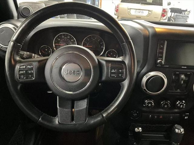 used 2014 Jeep Wrangler Unlimited car, priced at $19,938