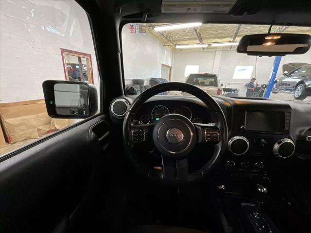 used 2014 Jeep Wrangler Unlimited car, priced at $19,117