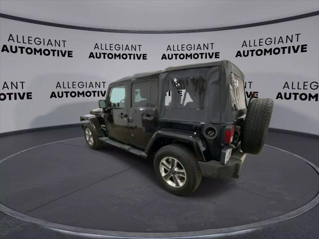 used 2014 Jeep Wrangler Unlimited car, priced at $19,117