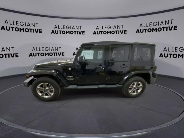 used 2014 Jeep Wrangler Unlimited car, priced at $19,117