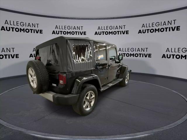 used 2014 Jeep Wrangler Unlimited car, priced at $19,117