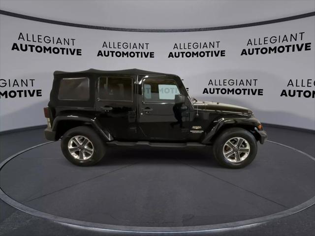 used 2014 Jeep Wrangler Unlimited car, priced at $19,938