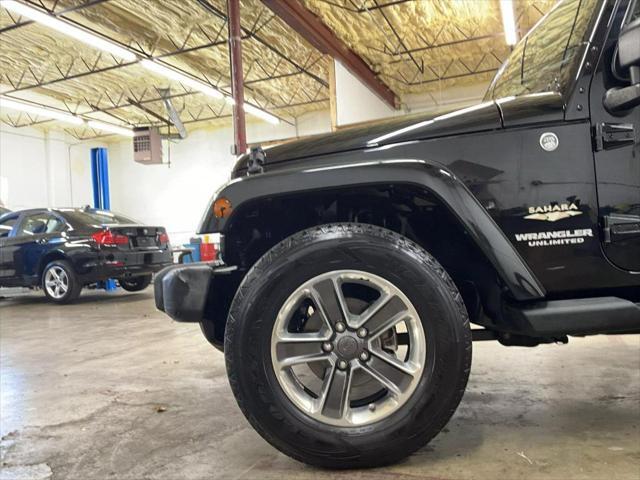 used 2014 Jeep Wrangler Unlimited car, priced at $19,938