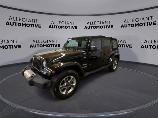 used 2014 Jeep Wrangler Unlimited car, priced at $19,938