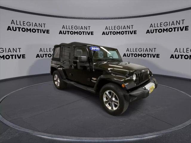 used 2014 Jeep Wrangler Unlimited car, priced at $19,938