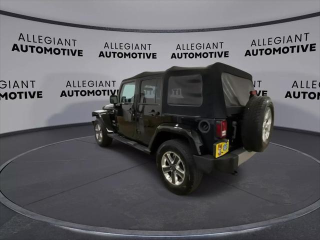 used 2014 Jeep Wrangler Unlimited car, priced at $19,938