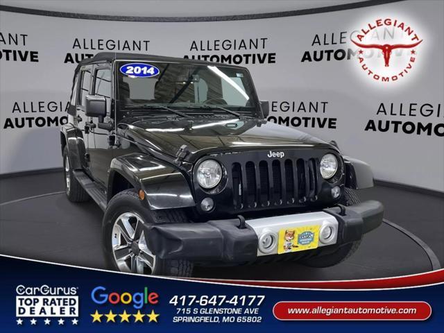 used 2014 Jeep Wrangler Unlimited car, priced at $19,938